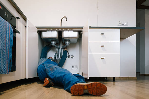 Professional Drain Cleaning technician working in Cambria, WI